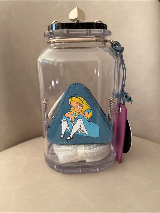 kate spade Handbags - Kate Spade X Disney clear jar crossbody with blue Alice applique and pink tag